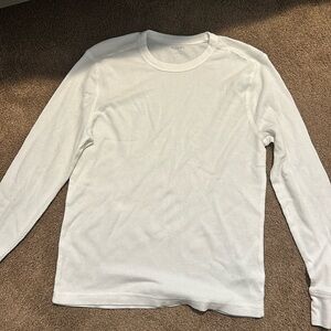 White long sleeve with waffle netting.